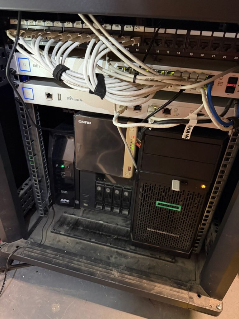 Upgraded server room rack with patch panel and patch cables