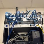 Server and network rack overview after an office IT setup in Langley, BC